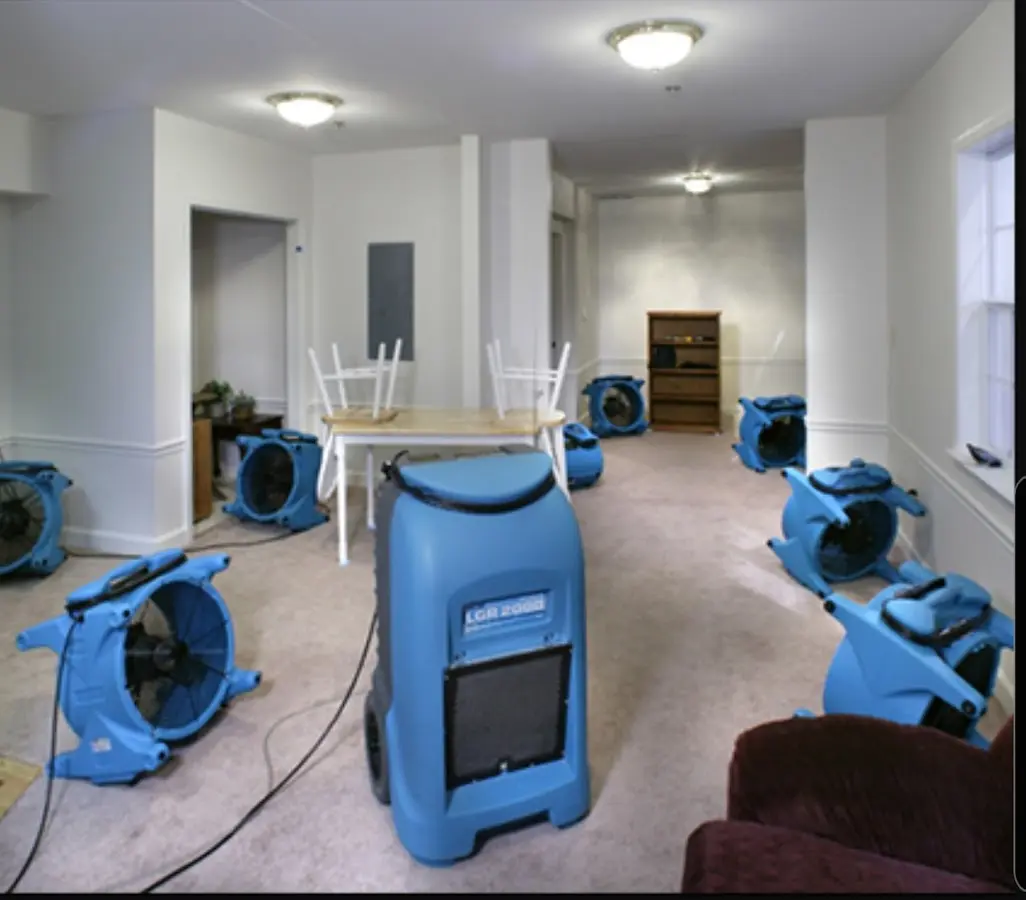 Air movers and dehumidifier setup for Water Damage Restoration in St. Francis